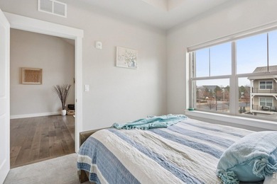 Enjoy low-maintenance living in this third-floor end-unit condo