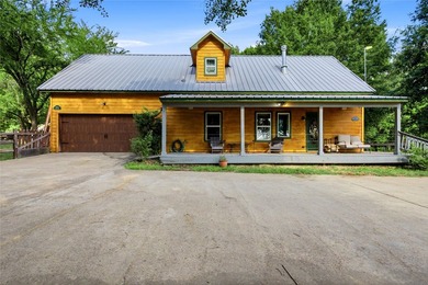 Enjoy the beauty of lake living in this spacious 4-bedroom - photo 2