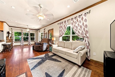 Enjoy the beauty of lake living in this spacious 4-bedroom - photo 3