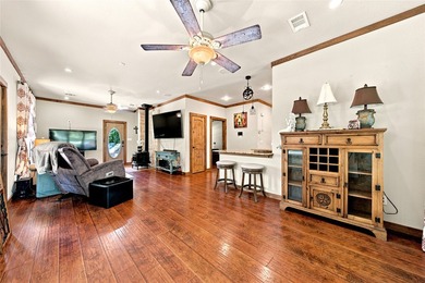 Enjoy the beauty of lake living in this spacious 4-bedroom - photo 5