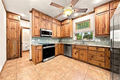 Enjoy the beauty of lake living in this spacious 4-bedroom - photo 6