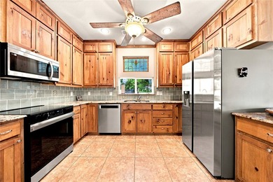 Enjoy the beauty of lake living in this spacious 4-bedroom - photo 7