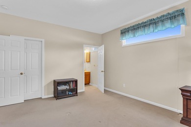 SOUGHT AFTER STAND ALONE CONDO IN SUMMIT TOWNSHIP! Striking curb