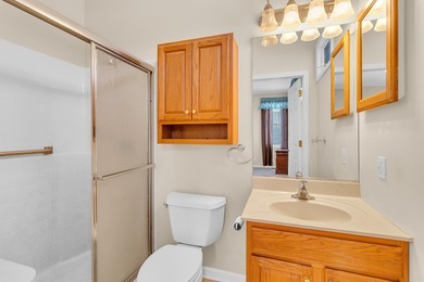 SOUGHT AFTER STAND ALONE CONDO IN SUMMIT TOWNSHIP! Striking curb