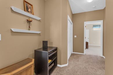 SOUGHT AFTER STAND ALONE CONDO IN SUMMIT TOWNSHIP! Striking curb