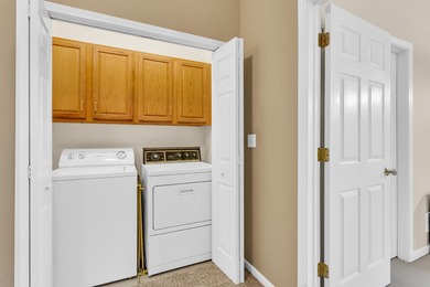 SOUGHT AFTER STAND ALONE CONDO IN SUMMIT TOWNSHIP! Striking curb