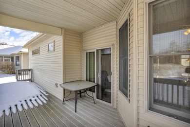 SOUGHT AFTER STAND ALONE CONDO IN SUMMIT TOWNSHIP! Striking curb