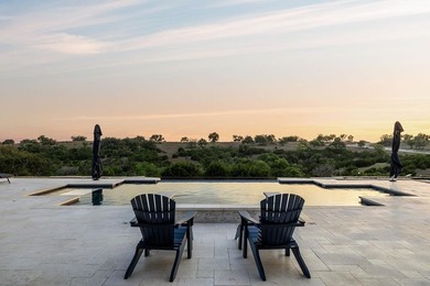 Set on 5.01 acres with a seasonal creek and natural spring, this - photo 3