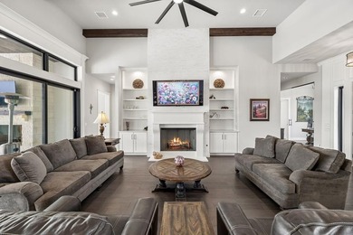 Set on 5.01 acres with a seasonal creek and natural spring, this - photo 7