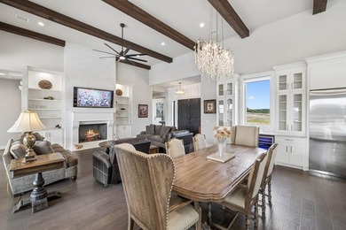 Set on 5.01 acres with a seasonal creek and natural spring, this - photo 8