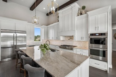 Set on 5.01 acres with a seasonal creek and natural spring, this - photo 10