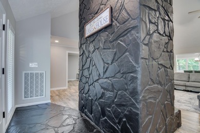 Located just 20 minutes from Evans, this updated Modoc lakehouse - photo 10
