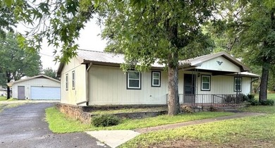This nicely updated 2-bedroom, 2-bath home sits on approximately - photo 1