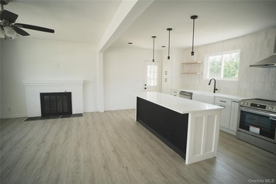 Discover the charm and comfort of this beautifully updated - photo 3