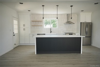 Discover the charm and comfort of this beautifully updated - photo 9