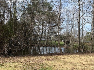 Highly sought after flat lot in Maplewood Estates with pond - photo 15
