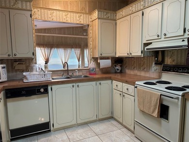 DON'T MISS THIS HIDDEN JEWEL OF A COMMUNITY. LOCATED IN THE - photo 3