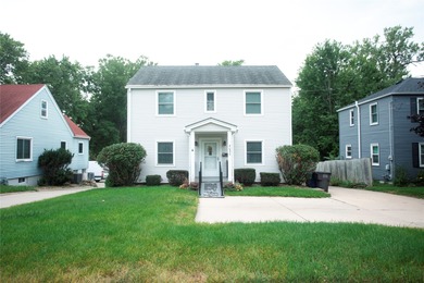 A welcoming home nestled in the desirable Beaverdale