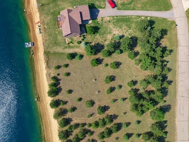 This beautiful lot on Stone Gate Lake offers sunset views and a - photo 3