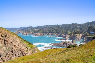 Unmatched views surround 3 sides of this rare oceanfront parcel - photo 11