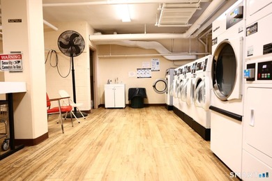 Stunning end unit 2-bedroom, 2-bath condo located in the - photo 12