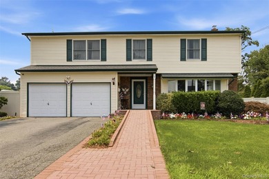Located in the heart of Syosset this remarkable home has an - photo 2