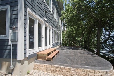 Beautiful LAKE KEGONSA HOME with 50' of frontage, pier, and - photo 2