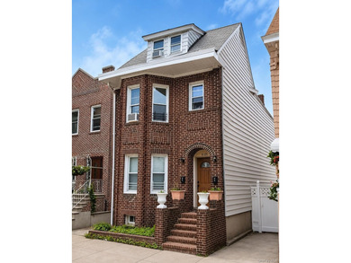 Welcome to this well-maintained legal 2-family home located in - photo 1