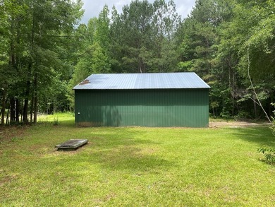 Tucked away on 5 private acres in Waverly Hall, this property - photo 24