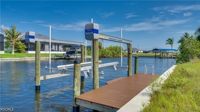 New - SEAWALL & 10,000-LB BOAT LIFT - on this GULF ACCESS lot in - photo 4