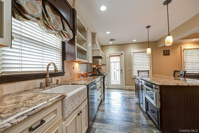 Oozing with charm this meticulously maintained brick Tudor is a - photo 6