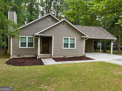 Welcome to this beautifully maintained four-bedroom, two-bath - photo 1