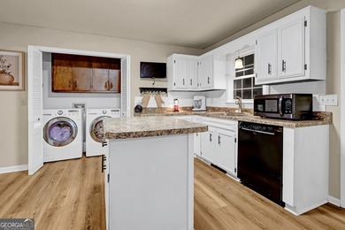 Welcome to this beautifully maintained four-bedroom, two-bath - photo 6