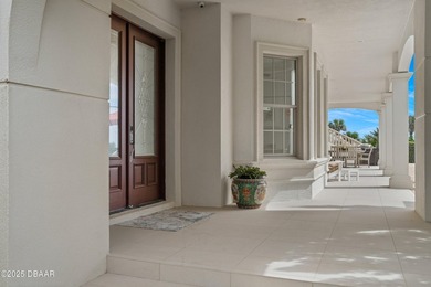 Perched on an oversized homesite in Hammock Beach, this 5,300 sq