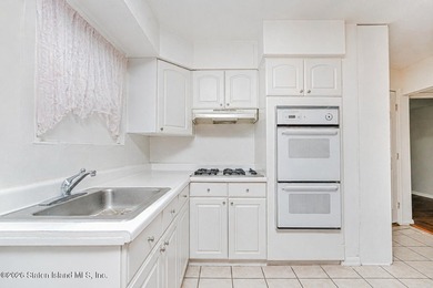 Welcome to 73 Gary Place! This large 2-family, semi-attached - photo 15