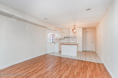 Welcome to 73 Gary Place! This large 2-family, semi-attached - photo 16