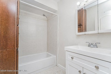 Welcome to 73 Gary Place! This large 2-family, semi-attached - photo 19