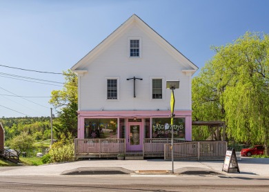 Highly visible and conveniently located in the scenic village of