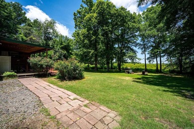 Enjoy lakefront living with this 3 bedroom, 2 bath home, sitting - photo 4