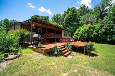 Enjoy lakefront living with this 3 bedroom, 2 bath home, sitting - photo 5