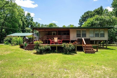 Enjoy lakefront living with this 3 bedroom, 2 bath home, sitting - photo 6
