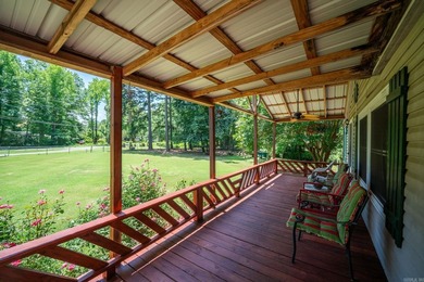 Enjoy lakefront living with this 3 bedroom, 2 bath home, sitting - photo 8