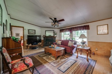 Enjoy lakefront living with this 3 bedroom, 2 bath home, sitting - photo 9