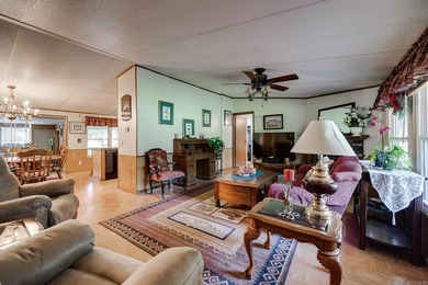 Enjoy lakefront living with this 3 bedroom, 2 bath home, sitting - photo 10