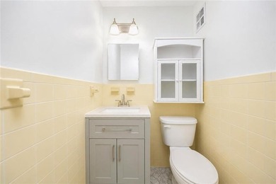 Rare-find semi-detached 2-family brick with a finished basement - photo 12