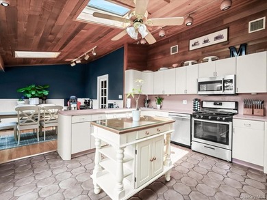 Welcome to 66 Moffitt Boulevard, a spacious three-bedroom - photo 7