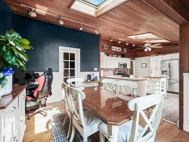 Welcome to 66 Moffitt Boulevard, a spacious three-bedroom - photo 9