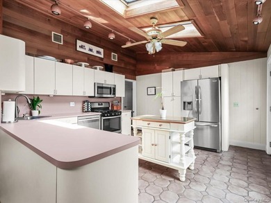 Welcome to 66 Moffitt Boulevard, a spacious three-bedroom - photo 10