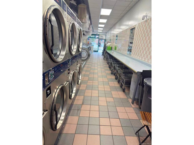 Established laundromat business available in the heart of - photo 4