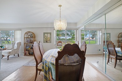 LOTS OF NATURAL LIGHT ENHANCE THE PANORAMIC VIEW OF GOLF AND - photo 7